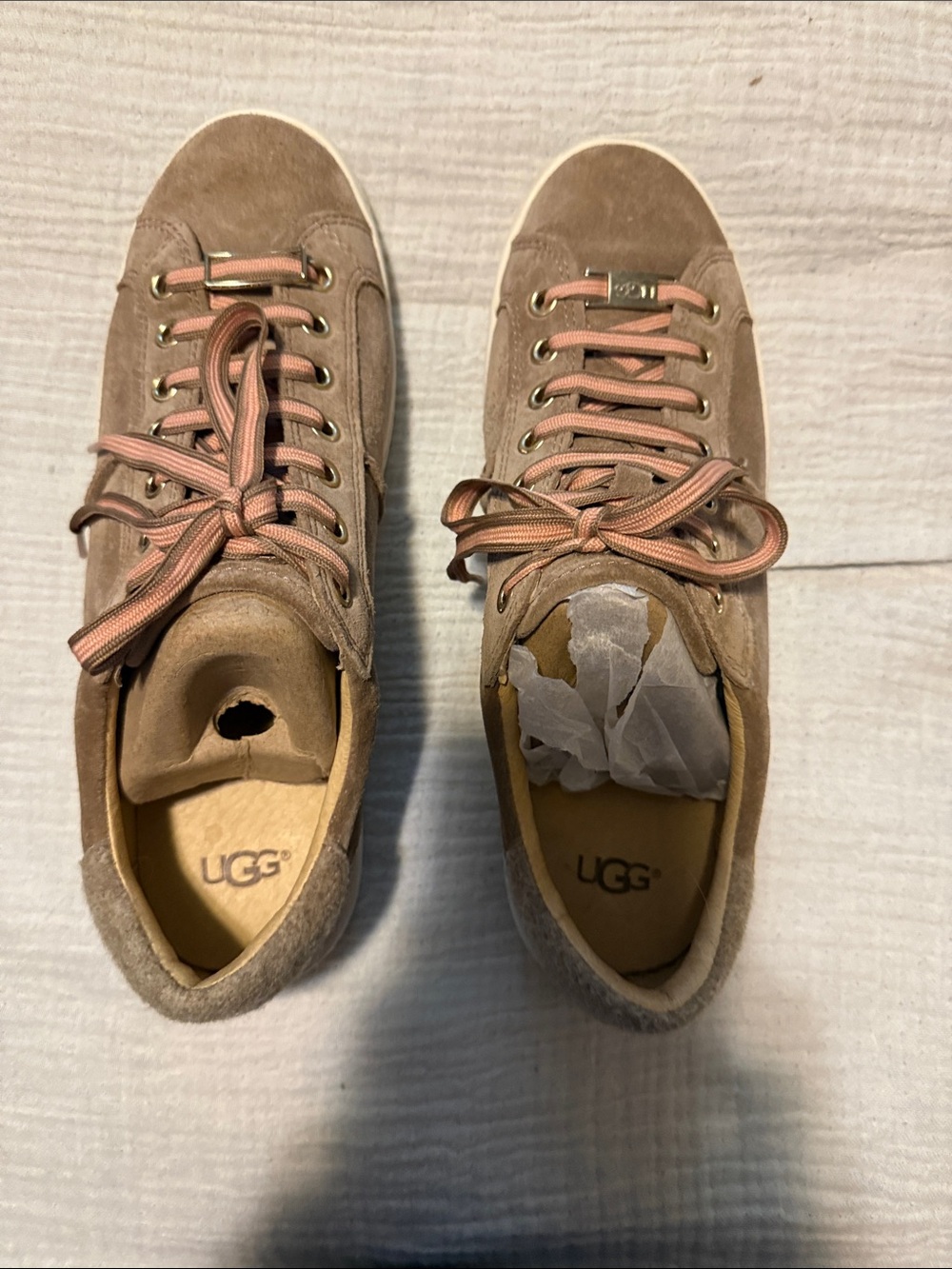 UGG women’s Suede Low-Top Sneakers in Taupe with Pink Laces